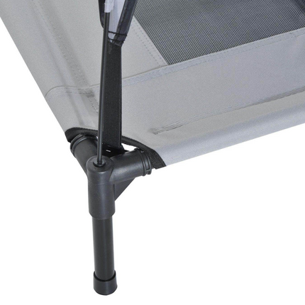 Close-up of a camping chair with mesh backrest and black metal frame on a white background